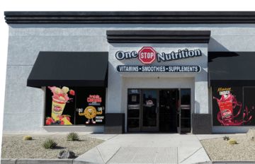 One Stop Nutrition store exterior featuring the brand logo and large window decals
