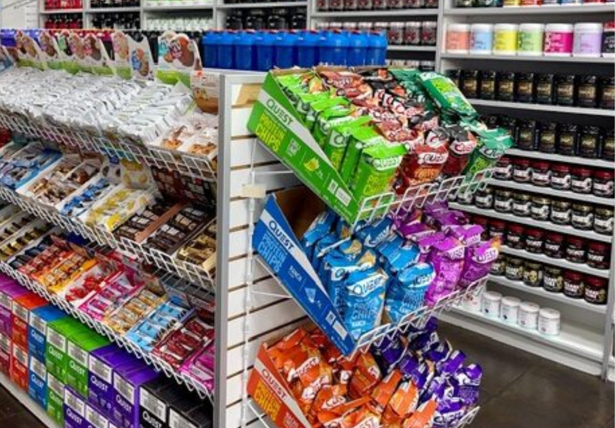 Interior view of organized supplement displays and wellness products inside a One Stop Nutrition store